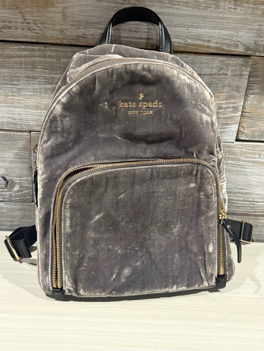 kate spade velvet backpack in charcoal gray with gold hardware